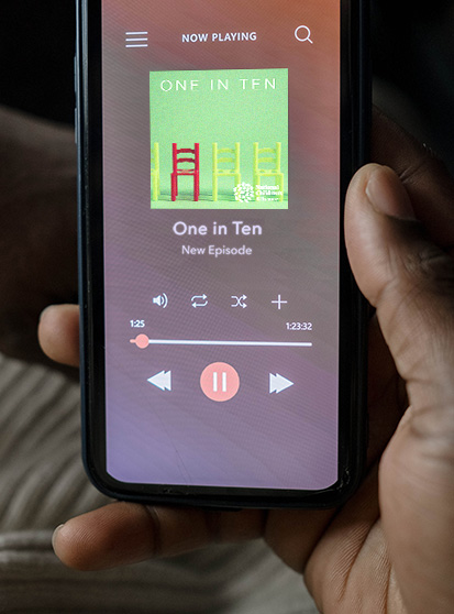 A smart phone screen displaying a new podcast episode of One in Ten